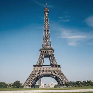 The Eiffel Tower in Paris on a clear day, architecturally ac
