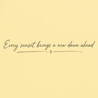 'Every sunset brings a new dawn ahead' written neatly on a p