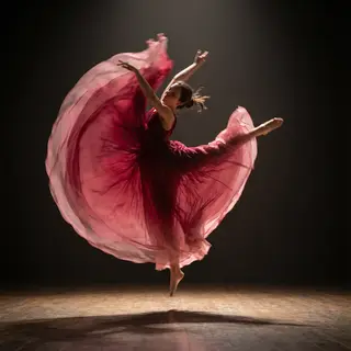 A dancer in a dynamic spin, dress flowing outward with one l