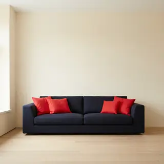 A minimalist room with walls in #F5E6CC (warm cream), a sofa