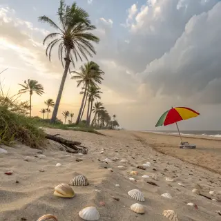 A sandy beach with palm trees, seashells, and a beach umbrel