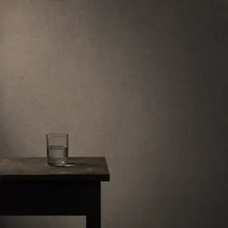 A still life painted in anxious minimalism — sparse composit