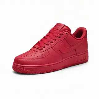 A single red sneaker on a clean white background with soft s