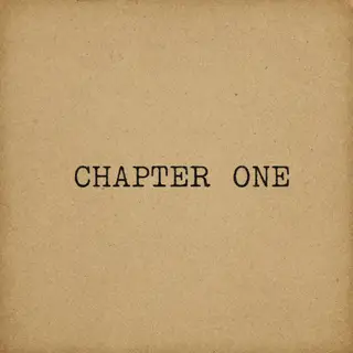 The word 'CHAPTER ONE' typed on aged paper with a vintage ty