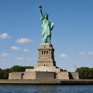 The Statue of Liberty on her island pedestal, with correct t