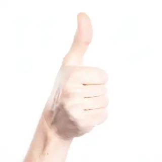 A hand giving a thumbs-up with four fingers curled and thumb