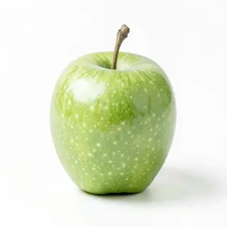 A ripe green apple on a seamless white background with soft 