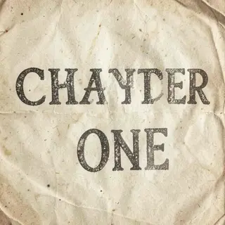 The word 'CHAPTER ONE' typed on aged paper with a vintage ty