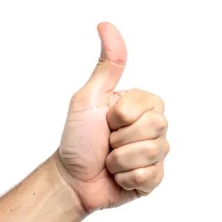 A hand giving a thumbs-up with four fingers curled and thumb
