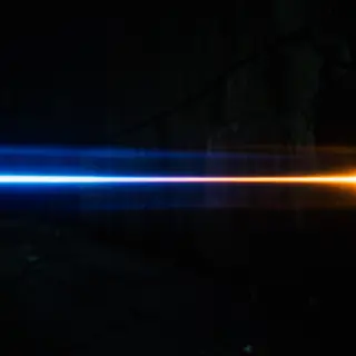 A cinematic frame with blue and orange anamorphic lens flare