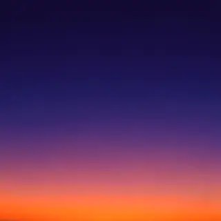 A sunset sky gradient on a flat surface from #FF6B35 (orange