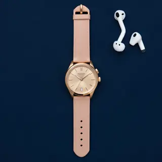A product flat-lay on a #1A1A2E (deep dark blue) background,