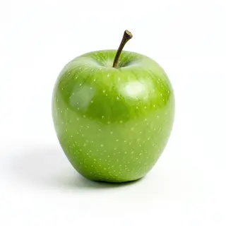 A ripe green apple on a seamless white background with soft 