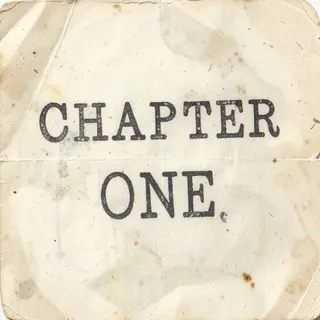 The word 'CHAPTER ONE' typed on aged paper with a vintage ty
