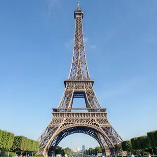 The Eiffel Tower in Paris on a clear day, architecturally ac