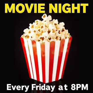 A movie night poster with a large popcorn image in the cente