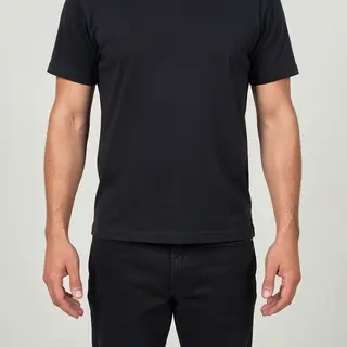 A person standing with both hands visible at their sides, fi