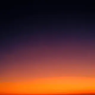 A sunset sky gradient on a flat surface from #FF6B35 (orange