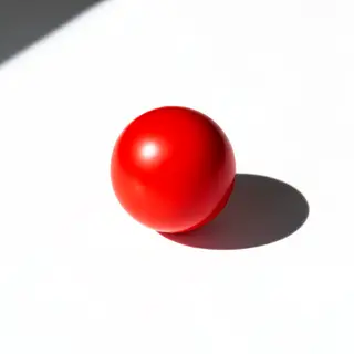 A red sphere on a white surface with a single shadow cast to