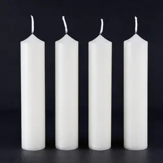 Exactly 4 white candles standing on a dark surface