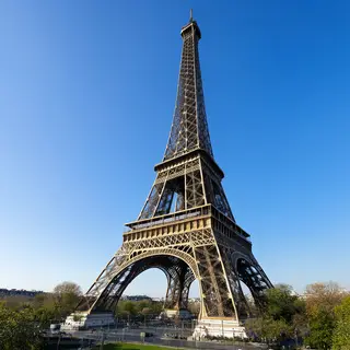 The Eiffel Tower in Paris on a clear day, architecturally ac