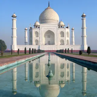 The Taj Mahal in Agra seen from the reflecting pool, with ac