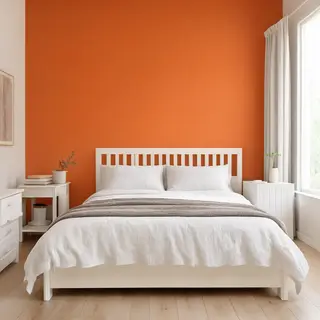 A bedroom wall painted in #FF6B35 (burnt orange) with white 