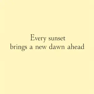'Every sunset brings a new dawn ahead' written neatly on a p