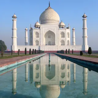 The Taj Mahal in Agra seen from the reflecting pool, with ac