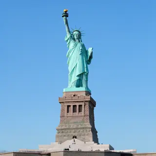 The Statue of Liberty on her island pedestal, with correct t