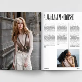 A fashion magazine spread with a full-bleed left-page photo,