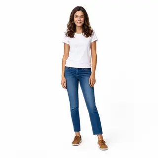 A woman standing upright in a relaxed pose, arms at her side