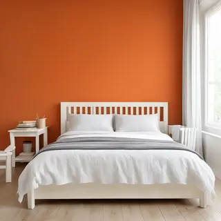A bedroom wall painted in #FF6B35 (burnt orange) with white 