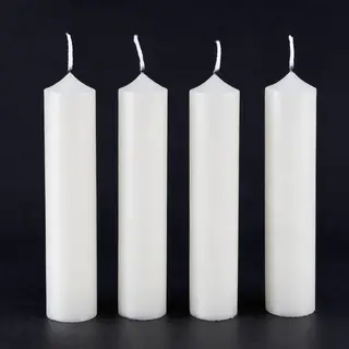 Exactly 4 white candles standing on a dark surface