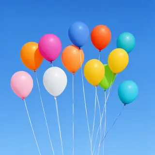 Exactly 11 colorful balloons floating against a clear blue s