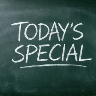 The phrase 'TODAY'S SPECIAL' written in white chalk on a dar