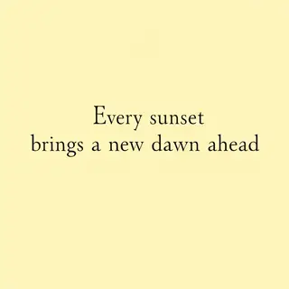 'Every sunset brings a new dawn ahead' written neatly on a p