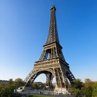 The Eiffel Tower in Paris on a clear day, architecturally ac
