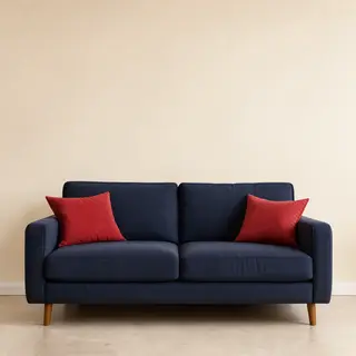 A minimalist room with walls in #F5E6CC (warm cream), a sofa