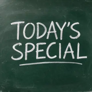 The phrase 'TODAY'S SPECIAL' written in white chalk on a dar