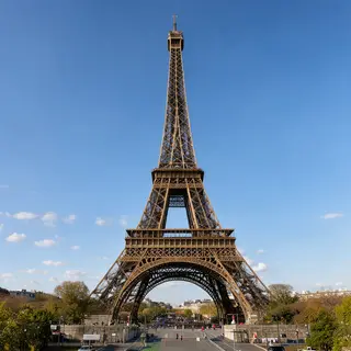 The Eiffel Tower in Paris on a clear day, architecturally ac