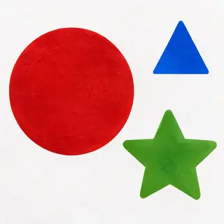 A large red circle, a small blue triangle, and a medium gree