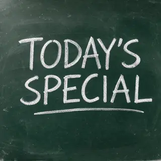 The phrase 'TODAY'S SPECIAL' written in white chalk on a dar