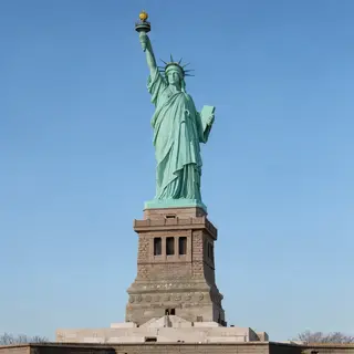 The Statue of Liberty on her island pedestal, with correct t