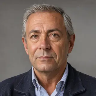 A portrait of a middle-aged man with a calm, serious express