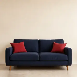 A minimalist room with walls in #F5E6CC (warm cream), a sofa