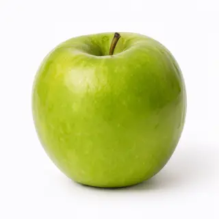 A ripe green apple on a seamless white background with soft 