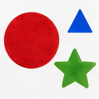 A large red circle, a small blue triangle, and a medium gree