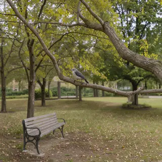 A bird perched on a branch, the branch extending from a tree