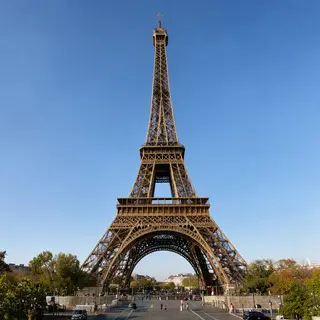 The Eiffel Tower in Paris on a clear day, architecturally ac